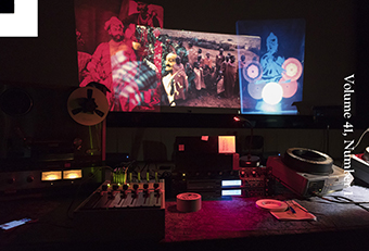 detail of the cover showing a photo of multiple slide projectors, projecting multiple images on top of one another