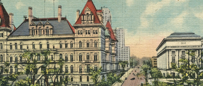 detail of historic postcard showing the capitol building in Albany