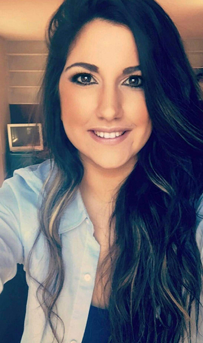 close up photo of Christina, smiling.